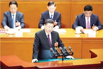  ??  ?? Xi delivers a speech during the closing session of the National People’s Congress at the Great Hall of the People in Beijing. — AFP photo