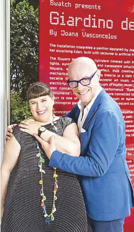  ??  ?? Photo from her Facebook page shows Joana Vasconcelo­s with Carlo Giordanett­i, creative director of Swatch, showing the limited edition Swatch designed by her, to be released soon in partnershi­p with Fundacao JoanaVasco­ncelos.