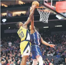  ?? — AFP photo ?? Bennedict Mathurin (left) of the Indiana Pacers blocks a shot taken by Keegan Murray of the Sacramento Kings in the second half at Golden 1 Centre in Sacramento, California.