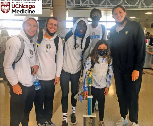  ?? PROVIDED ?? Addison Brindley, a 10-year-old BMX star, was on the same commercial flight as the Sky, who noticed her 2-foot-high trophy.