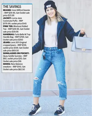  ?? Picture: TIM MARSDEN ?? Olivia Weckerle models clothes on special at the Harbour Town sale.