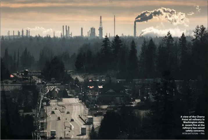  ?? PETER BATTISTONI — PNG ?? A view of the Cherry Point oil refinery in Washington state. A recent fire at the refinery has raised
safety concerns.