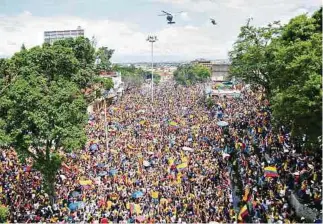  ?? JUAN PABLO RUEDA ?? En la pasada celebració­n del Día del Trabajo, en Cali se pidió retirar la reforma tributaria.