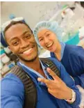  ?? —AFP photos ?? This handout selfie courtesy of Dr Jason Campbell shows him posing with program nurse Grace Choi on March 18, 2020 at the Oregon Health & Science University Hospital in Portland.