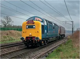  ?? John Hales ?? Welcome back: For the first time in just over four years, 55009 Alycidon returns to main line action, hauling 57012 from Barrow Hill to Carnforth through Garstang on a rather overcast March 28. The main line tests of the locomotive were operated by West Coast Railways, with the Class 57 provided as insurance.