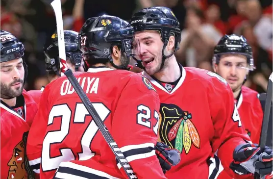  ?? | JONATHAN DANIEL/ GETTY IMAGES ?? Niklas Hjalmarsso­n and Johnny Oduya, who are coming off injuries, will be reunited as the Blackhawks’ shutdown pairing Thursday against the Ducks.