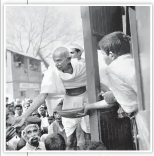  ??  ?? ■ Mahatma Gandhi collecting donations for the Harijan Fund in Assam, 1945. NATIONAL GANDHI MUSEUM