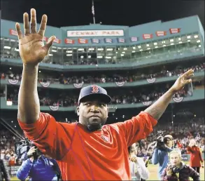  ?? Charles Krupa / Associated Press ?? Boston Red Sox’s David Ortiz waves from the field at Fenway Park after Game 3 of an American League Division Series against the Cleveland Indians in Boston, on Oct. 10, 2016. Officials say Ortiz, who was shot in the Dominican Republic on June 9, at an outdoor cafe, was the victim of incompeten­t criminals who were trying to kill a man next to him.