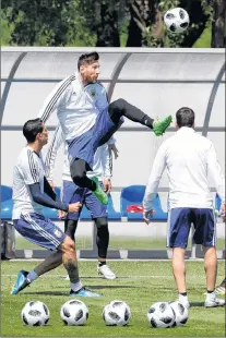  ?? AP PHOTO ?? With superstar Lionel Messi in the lineup, Erik Mathiasen of the C.B.S. Strikers team which plays in the Johnsons provincial Challenge Cup league feels his native Argentina will win the World Cup.