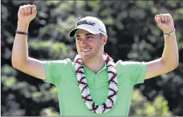  ?? GETTY IMAGES ?? Justin Thomas celebrates on the 18th green during the final round of the SBS Tournament of Champions. A win Sunday moved him up to a No. 12 world ranking.