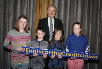  ??  ?? Marshalsto­wn NS, who finished fourth in the Under 11 section. Back: Nicky Cosgrave (chairman ECU). Front: Síofra Morris, Niall Martin, Tomás Tyrrell and Bronagh Lett.