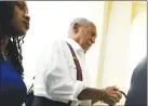  ??  ?? Bill Cosby in handcuffs