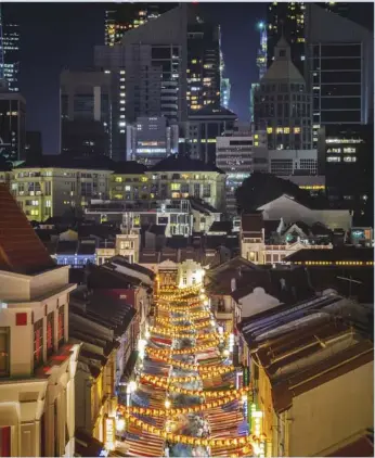  ??  ?? Singapore’s Chinatown night market