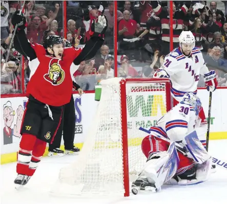  ?? JEAN LEVAC ?? Tommy Wingels celebrates teammate Erik Karlsson’s goal Thursday during the Senators’ Game 1 victory over the Rangers in Ottawa.