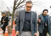  ?? ANDREW HARNIK/AP ?? Rep. George Santos, R-N.Y., leaves a House GOP conference meeting Wednesday on Capitol Hill.