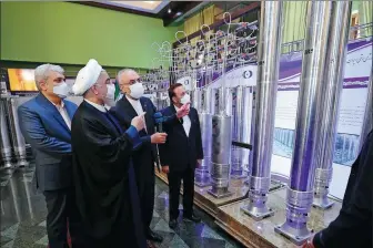  ?? IRANIAN PRESIDENCY OFFICE / WANA ?? Iranian President Hassan Rouhani on Saturday visits an exhibition in Teheran that displays equipment used in the country’s nuclear program.