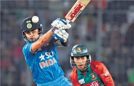  ?? AFP PHOTO ?? Virat Kohli continued his run of form with another matured knock as India chased down Bangladesh’s target with seven balls to spare.