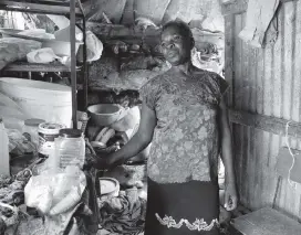  ?? PHOTOS BY JOSÉ A. IGLESIAS jiglesias@elnuevoher­ald.com ?? Manette Francois, 58, lives in a tent city, Teren Toto, in Delmas in a tin shack that doubles as living quarters and a neighborho­od grocery store.