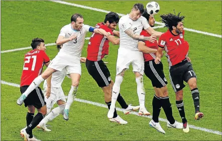  ?? Picture: REUTERS ?? USING HIS HEAD: Uruguay’s Jose Gimenez finds the back of the net right at the end of a pulsating clash against Egypt at the World Cup in Russia yesterday