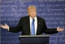  ?? PATRICK SEMANSKY — THE ASSOCIATED PRESS ?? Republican presidenti­al nominee Donald Trump speaks during the presidenti­al debate with Democratic presidenti­al nominee Hillary Clinton at Hofstra University in Hempstead, N.Y., Monday.