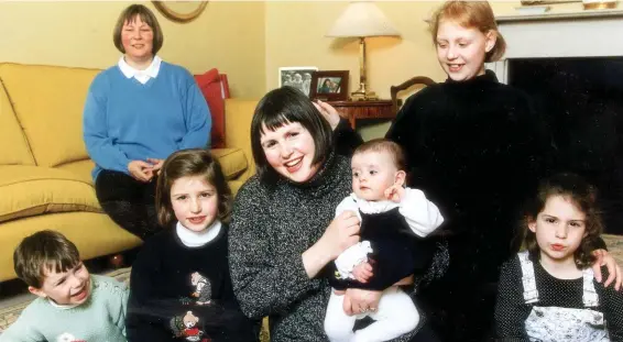  ??  ?? Supermum: Nicola in 1997 with baby Antonia and, from left, Rupert, Alice, Georgina and Serena and, seated behind, their nanny