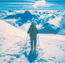  ?? Photos / Toomas Tartes; Getty Images ?? On the way back from Huayna Potosi peak, Bolivia.