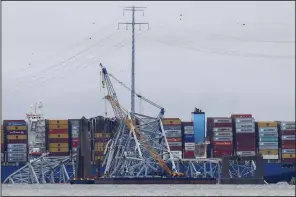  ?? (AP/Julia Nikhinson) ?? Salvage work continues on the collapsed Francis Scott Key Bridge in Baltimore on Tuesday.