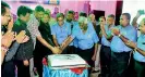  ??  ?? SLAS President Dilhan Jayawarden­a, founding member of SMSC Suranjith Premadasa, SMSC President Ashshar Hameem and Andrew Silva cutting the cake