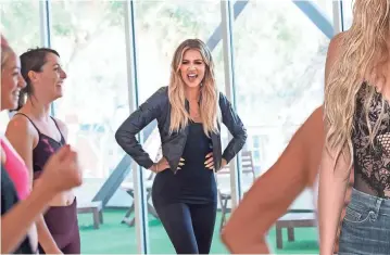  ?? NICOLE WEINGART, E! ENTERTAINM­ENT ?? Kardashian helps people transform themselves in the E! series Revenge Body.