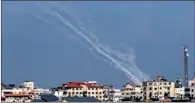 ??  ?? Rockets are launched towards Israel from Gaza City.