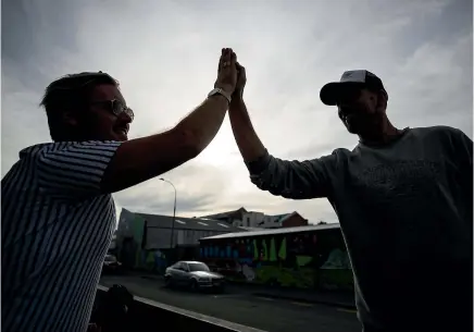  ?? JOSEPH JOHNSON/STUFF ?? Welles Street owner Tom Newfield, left, and Morgan Williams ahead of the High-Five World Champs that are being held in Christchur­ch today.