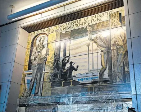  ?? ERIN HOOLEY/CHICAGO TRIBUNE ?? WPA-era murals displayed on the Uptown Post Office walls celebrate the accomplish­ments of architect Louis Sullivan and poet Carl Sandburg.