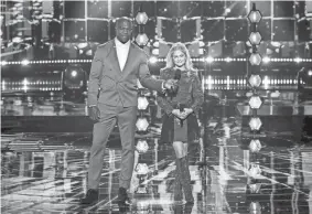  ?? ?? Host Terry Crews and Oklahoma City contestant Darci Lynne appear on the Feb. 5 episode of “America’s Got Talent: Fantasy League.” PROVIDED BY CHRIS HASTON/NBC