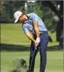  ?? Tom Pennington / Getty Images ?? Xander Schauffele of the United States plays a shot on the 17th hole during the third round of the Charles Schwab Challenge on Saturday at Colonial Country Club in Fort Worth, Texas.
