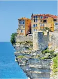  ??  ?? Top of the morning: houses in Bonifacio cling startlingl­y close to the cliff edge