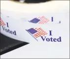  ?? Ned Gerard / Hearst Connecticu­t Media ?? Voting stickers