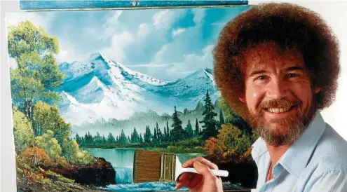  ?? FOTO: BOB ROSS INC. / DPA ?? TV-Kunstlehre­r Bob Ross steht während der Sendung „The Joy of Painting“vor einem Gemälde.