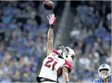  ?? GREGORY SHAMUS/GETTY IMAGES ?? Arizona Cardinals cornerback Patrick Peterson tries to defect a pass against the Detroit Lions, at Ford Field in Week 1.