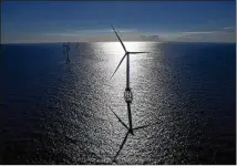  ?? ERIC THAYER / BLOOMBERG ?? States in the Northeast are hoping to model an offshore program after the GE-Alstom Block Island Wind Farm off Rhode Island. Most wind farms now are constructe­d in Europe.
