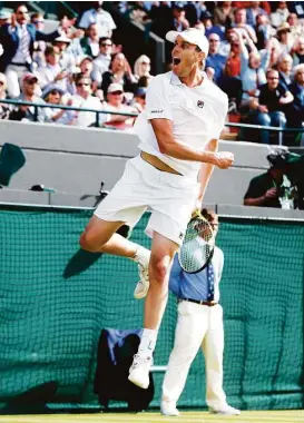  ?? Alastair Grant photos / Associated Press ?? American Sam Querrey jumps for joy after his 7-6 (6), 6-1, 3-6, 7-6 (5) thirdround upset of top-ranked Novak Djokovic.