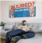  ??  ?? 10. NewYorkNic­o at home with his Cellino & Barnes poster.