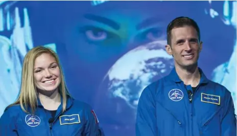  ?? GRAHAM HUGHES/THE CANADIAN PRESS ?? Jennifer Sidey, 29, and Joshua Kutryk, 35, have begun two years of intense basic training, including learning about space station systems and robotics.