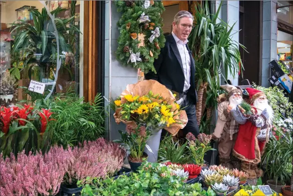  ?? Picture: Jane Barlow/pa ?? Labour Party leader Sir Keir Starmer during a visit yesterday to the Stalks & Stem store, a small business in Shawlands, Glasgow