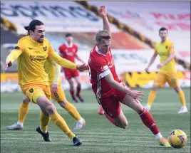  ??  ?? Ciaron Brown battles Ross McCrorie in his last game for Livingston