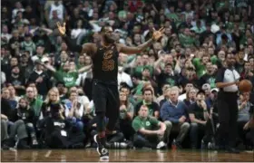  ?? ELISE AMENDOLA — THE ASSOCIATED PRESS ?? LeBron James gestures during the second half in Game 7 of the Eastern Conference finals against the Celtics May 27 in Boston.
