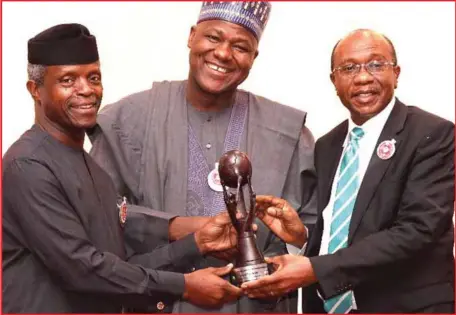  ??  ?? L-R: Vice-President Yemi Osinbajo; Speaker of the House of Representa­tives Rt. Hon. Yakubu Dogara; and Central Bank of Nigeria governor, Mr. Godwin Emefiele; when the VP presented the PEBEC Impact Award to Emefiele in recognitio­n of his contributi­ons...