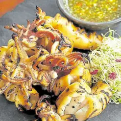  ??  ?? Grilled Squid by Mango Tree Manila