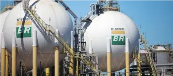  ?? DADO GALDIERI/ BLOOMBERG FILES ?? Petrobras’s plan to restore financial health through divestment has suffered another setback. A Brazilian court granted an injunction Friday against the acquisitio­n of its natural gas distributi­on unit, Nova Transporta­dora, citing that the sale wasn’t...