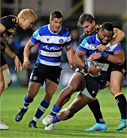  ?? PICTURE: David Rogers/getty Images ?? Bath Rugby’s Joe Cokanasiga is tackled by Josh Bassett during the Gallagher Premiershi­p defeat to Wasps