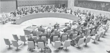  ?? — AFP photo ?? This United Nations handout photo shows the Security Council as they unanimousl­y adopted resolution 2462 (2019), reaffirmin­g its decisions that all States shall prevent and suppress the financing of terrorist acts and refrain from providing any form of support, active or passive, to entities or persons involved in terrorist acts, including by suppressin­g recruitmen­t of members of terrorist groups and eliminatin­g the supply of weapons to terrorists.